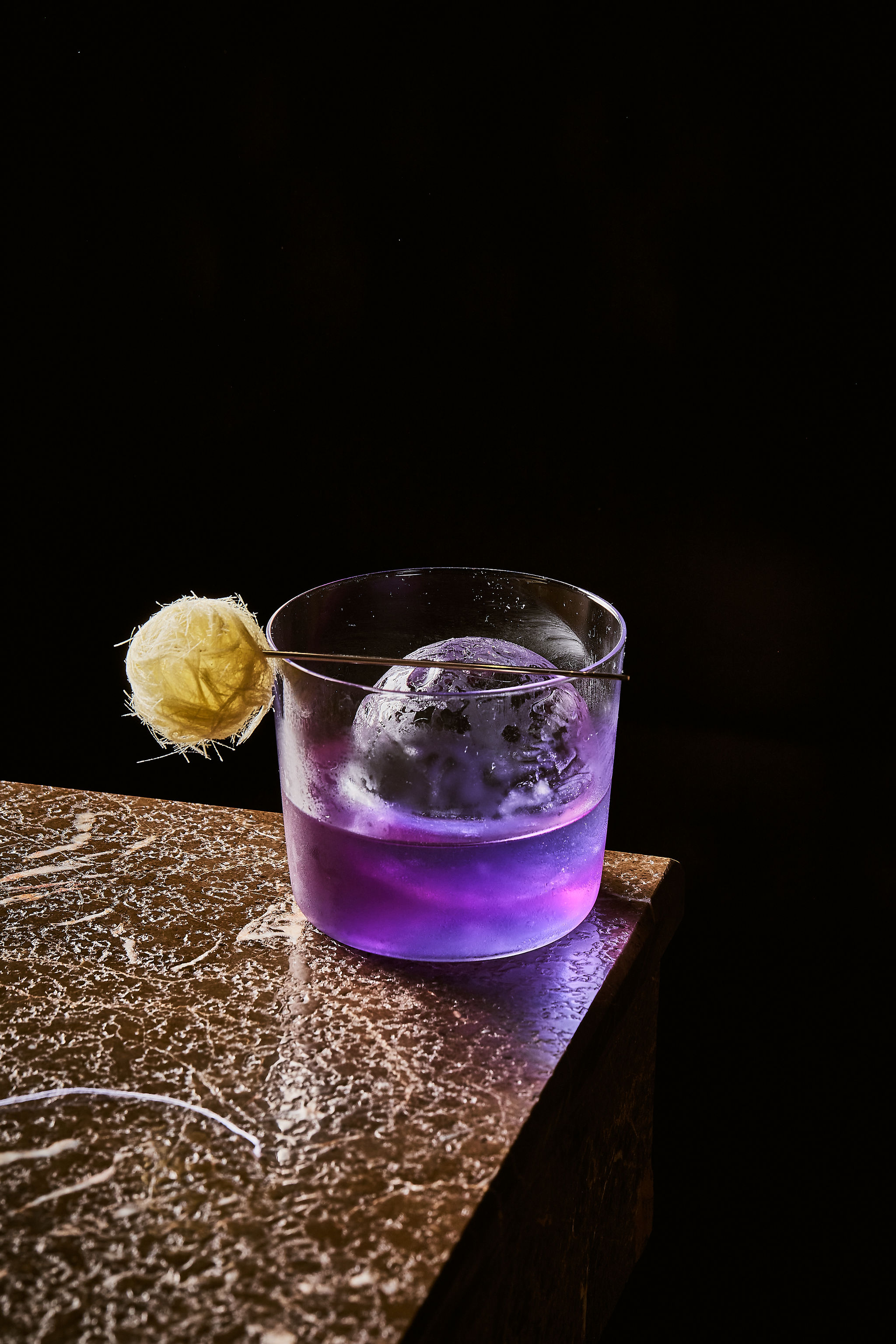 The Stitch — purple cocktail